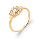 Bague entourage octogonal perlé et zircon central en plaqué or, vue de trois quarts