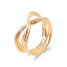 Bague fils d’or croisés en X dont un pavé de zircons en plaqué or, vue de trois quarts