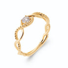 Bague fils d’or entrelacés en vagues lisses et perlés zircon en plaqué or