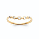 Bague fine cinq petits zircons espacés en plaqué or