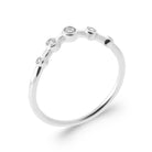 Bague fine constellation de zircons sertis clos en argent 925