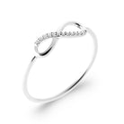 Bague fine courbe pavée de zircons en argent 925