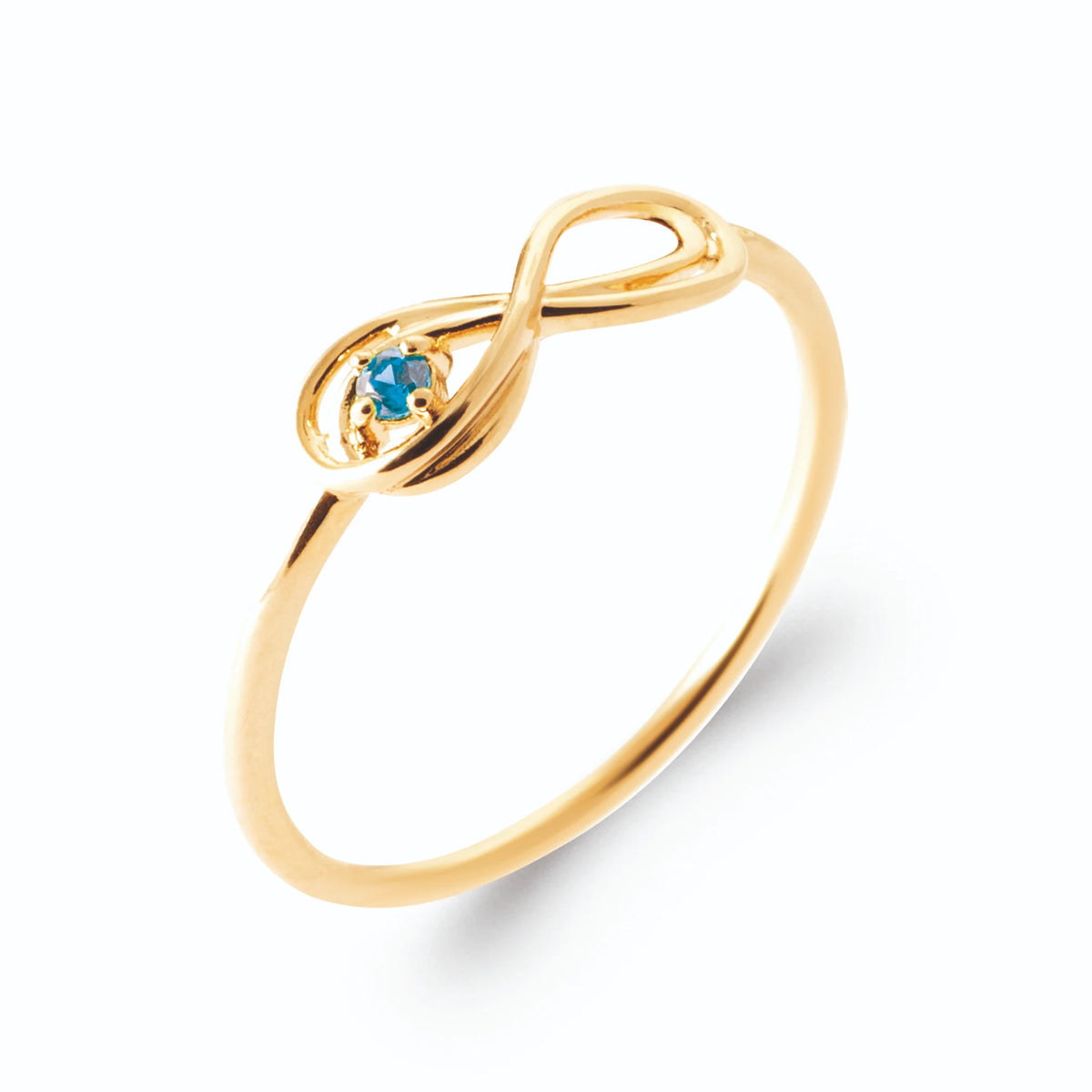 Bague fine infini et petite pierre bleu ciel en plaqué or, vue de trois quarts
