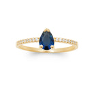 Bague fine pierre bleu nuit taille poire et liseré de zircons en plaqué or