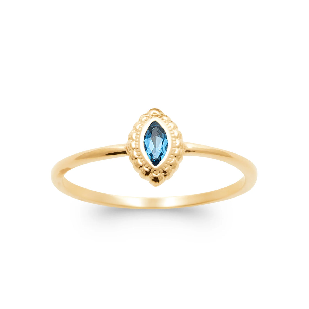 Bague fine solitaire pierre navette bleu profond cadre perlé plaqué or, vue de face