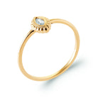 Bague fine solitaire zircon navette cadre perlé en plaqué or, vue de trois quarts