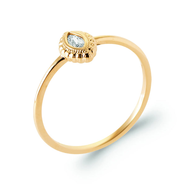 Bague fine solitaire zircon navette cadre perlé en plaqué or, vue de trois quarts