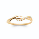 Bague fine torsade et brin serti de petits zircons plaqué or, vue de face