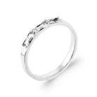 Bague fine zircons baguettes en biais en argent 925