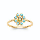Bague fleur pierre vert olive et pétales turquoise en plaqué or