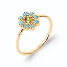 Bague fleur pierre vert olive et pétales turquoise en plaqué or