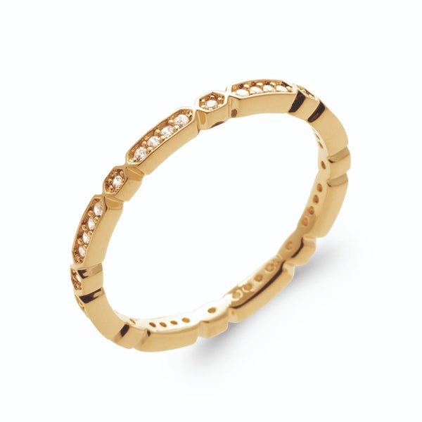 Bague frise d’ovales et pastilles sertis de zircons en plaqué or, vue de trois quarts