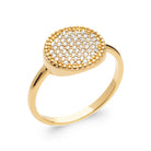 Bague grand disque rond pavé de zircons bordé de grains d’or en plaqué or