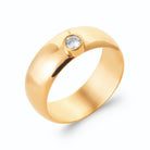 Bague jonc large bombé et zircon rond serti clos en plaqué or