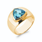 Bague large plateau poli et grande pierre trillion bleu ciel en plaqué or