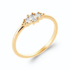 Bague ligne de trois zircons ovale et poires perlée en plaqué or