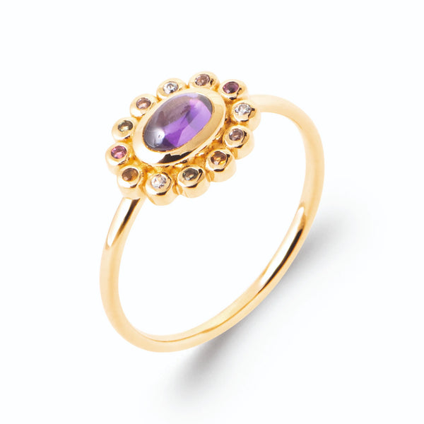 Bague marguerite cabochon violet et pierres multicolores en plaqué or, vue de trois quarts