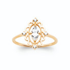 Bague médaillon festonné zircon navette plaqué or, vue de face