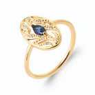 Bague médaillon ovale filigrané pierre navette bleu nuit et zircons en plaqué or
