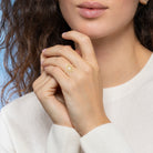 Bague médaillon ovale filigrané zircon navette en plaqué or