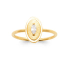 Bague médaillon ovale guilloché et zircon navette en plaqué or