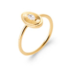 Bague médaillon ovale guilloché et zircon navette en plaqué or