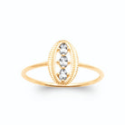 Bague médaillon ovale trois zircons plaqué or, vue de face