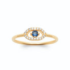 Bague œil en amande pavé de zircons et pierre bleue en plaqué or