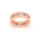 Bague Olympe torsadée en or rose 18 carats, pierres fines et précieuses