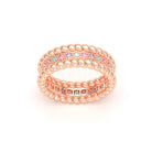 Bague Olympe torsadée en or rose 18 carats, pierres fines et précieuses