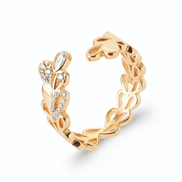 Bague ouverte cœurs ajourés entrelacés et zircons en plaqué or, vue de trois quarts
