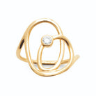 Bague ouverte spirale de fil d’or et zircon au cœur plaqué or, vue de face