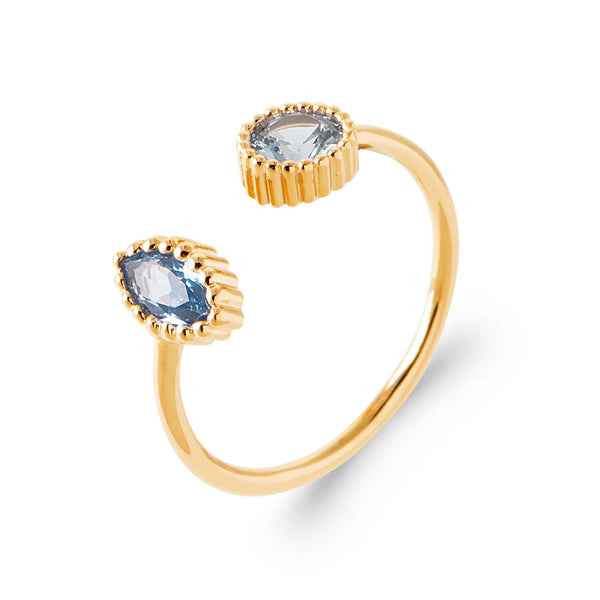Bague ouverte toi et moi navette et ovale bleu ciel en plaqué or, vue de trois quarts