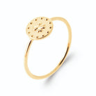 Bague pastille perlée et petite fleur en relief en plaqué or