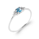 Bague pierre bleue coussin et grappes de zircons en argent 925