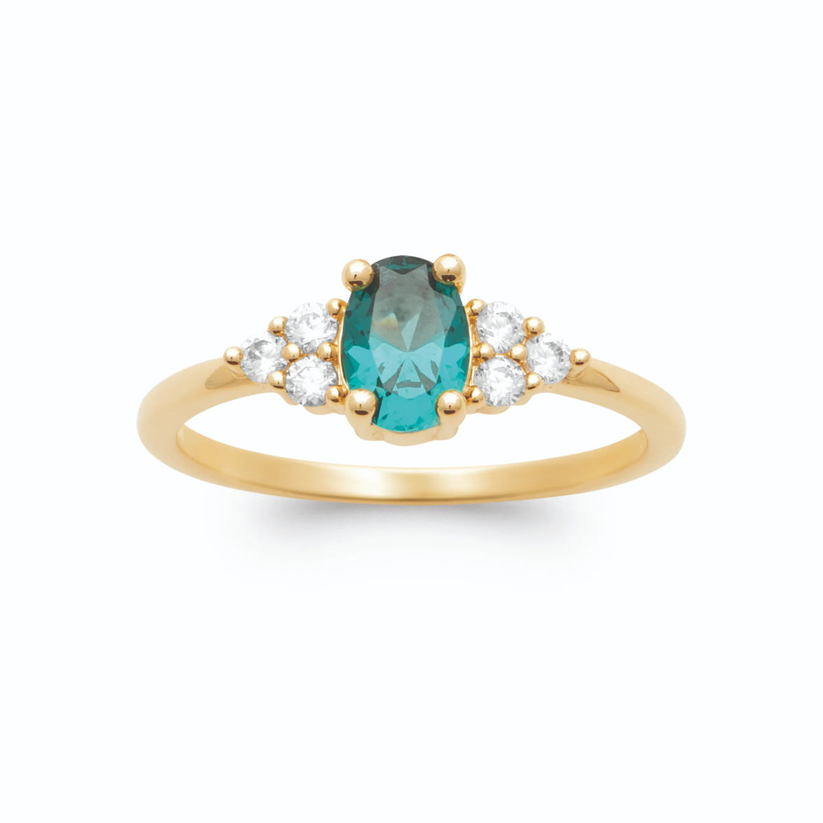 Bague pierre ovale bleu canard et trios de zircons en plaqué or