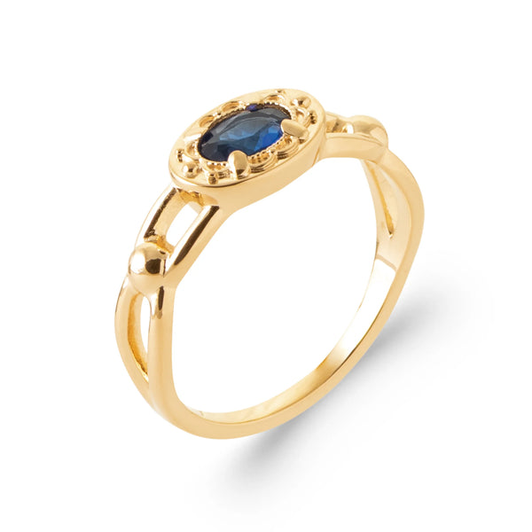 Bague pierre ovale bleu nuit entourage festoné en plaqué or