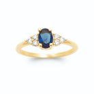 Bague pierre ovale bleu nuit et trios de zircons en plaqué or