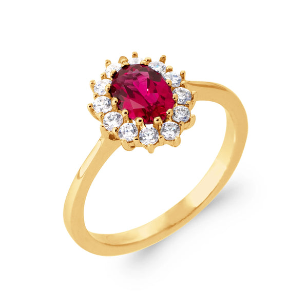 Bague pierre ovale rouge framboise et corolle de gros zircons en plaqué or, vue de trois quarts