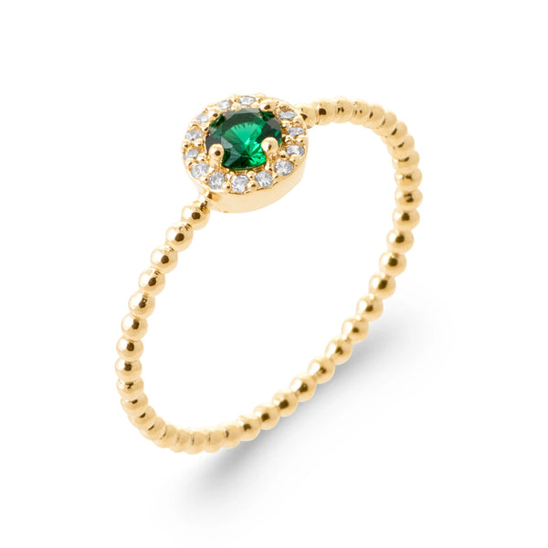 Bague pierre vert émeraude entourée de zircons et anneau perlé en plaqué or, vue de trois quarts