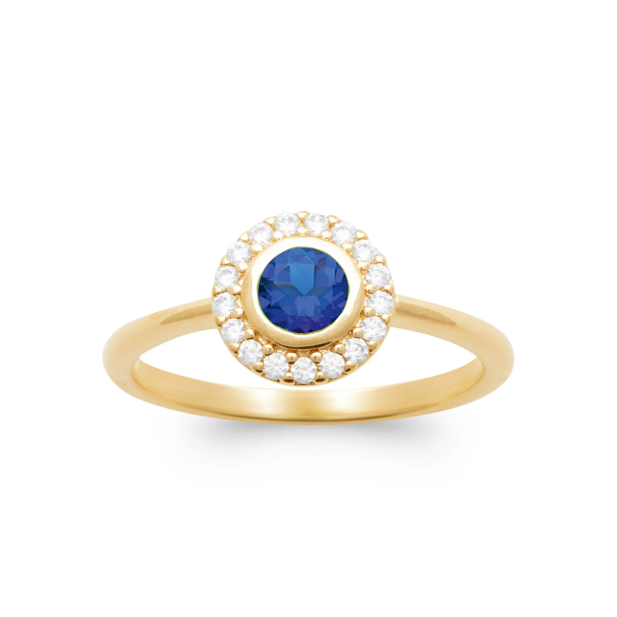 Bague ronde bleu outremer serti clos entourage de zircons en plaqué or