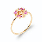 Bague rose des vents filigranée quatre pierres roses en plaqué or
