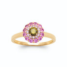 Bague rosette pierre vert olive et cercles de pierres blanches et rose lilas en plaqué or