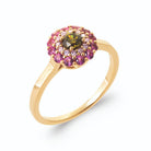 Bague rosette pierre vert olive et cercles de pierres blanches et rose lilas en plaqué or