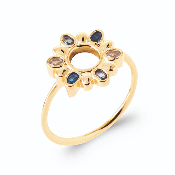Bague soleil ajourée pétales de pierres bleu nuit et fumées en plaqué or