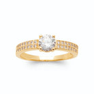 Bague solitaire zircon et épaules pavées de zircons en plaqué or