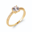 Bague solitaire zircon et fine ligne de zircons sur les épaules en plaqué or