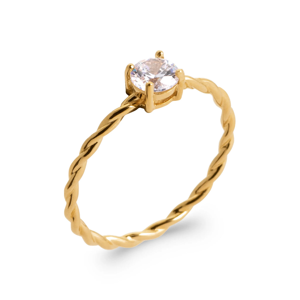 Bague solitaire zircon rond quatre griffes sur anneau torsadé en plaqué or, vue de trois quarts