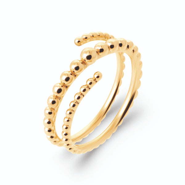 Bague spirale deux tours en billes d’or dégradées en plaqué or, vue de trois quarts