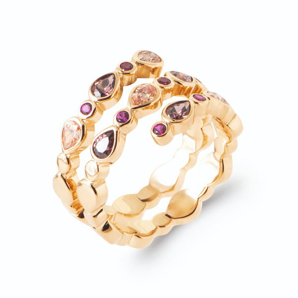 Bague spirale trois tours pierres poires fuchsia, pêche et taupe en plaqué or, vue de trois quarts